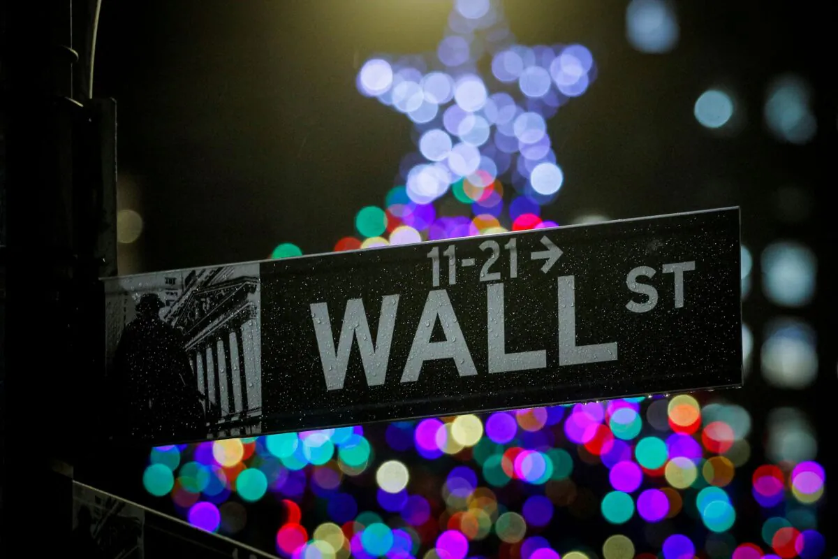 The Wall Street sign is seen outside the New York Stock Exchange (NYSE) in New York, on Dec. 17, 2019. (Brendan McDermid/Reuters)
