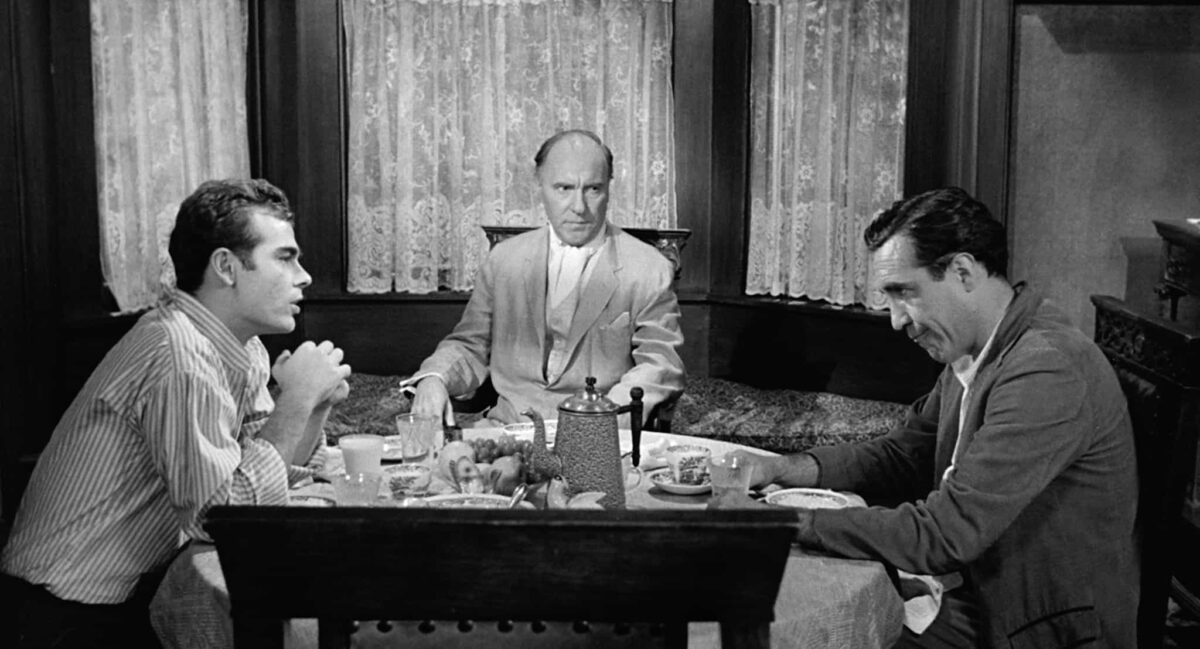 The 1962 film version of “Long Day’s Journey Into Night” stars (L–R) Dean Stockwell as Edmund, Ralph Richardson as James, and Jason Robards Jr. as Jamie Tyrone. (Embassy Pictures)
