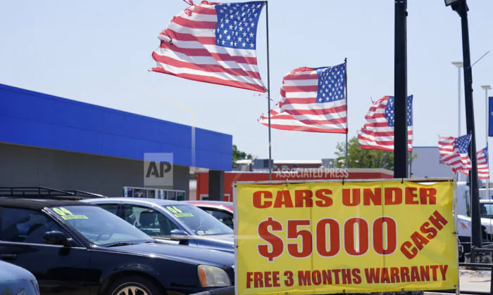 Used cars for sale are on display in Oklahoma City, Okla., on June 24, 2021. (Sue Ogrocki/AP Photo)