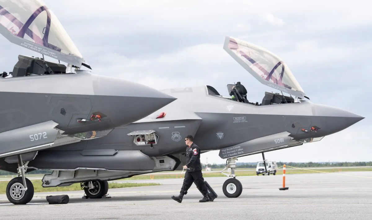 F-35A Lightning II fighter jets, part of a demonstration team for an airshow, at the airport in Ottawa on Sept. 4, 2019. (The Canadian Press/Adrian Wyld)