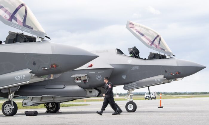 F-35A Lightning II fighter jets, part of a demonstration team for an airshow, at the airport in Ottawa on Sept. 4, 2019. (The Canadian Press/Adrian Wyld)