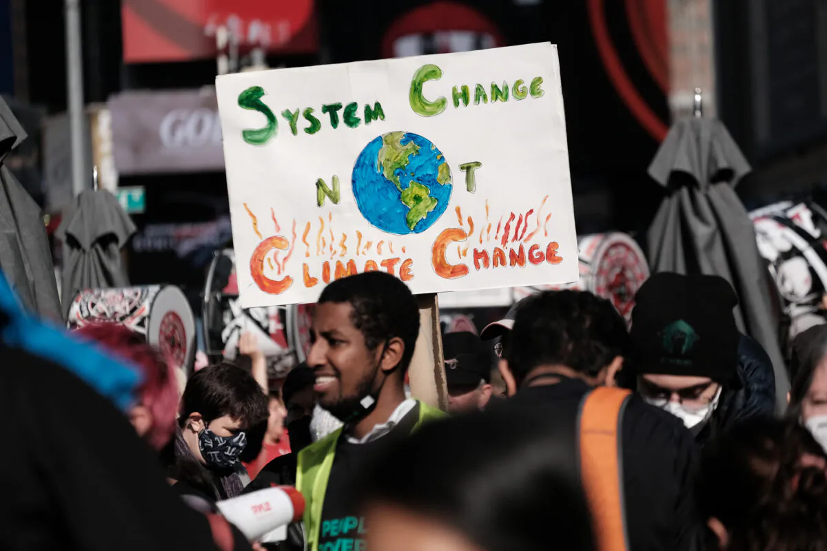 Hundreds of climate protesters walk from Times Square to New York Governor Kathy Hochul’s office to demand more action against climate change in New York City on Nov. 13, 2021. (Spencer Platt/Getty Images)
