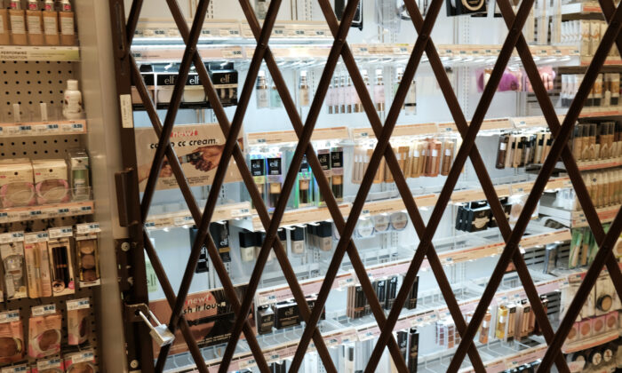A gate is used to lock items at a pharmacy and convenience store on October 26, 2021 in New York City. (Spencer Platt/Getty Images)