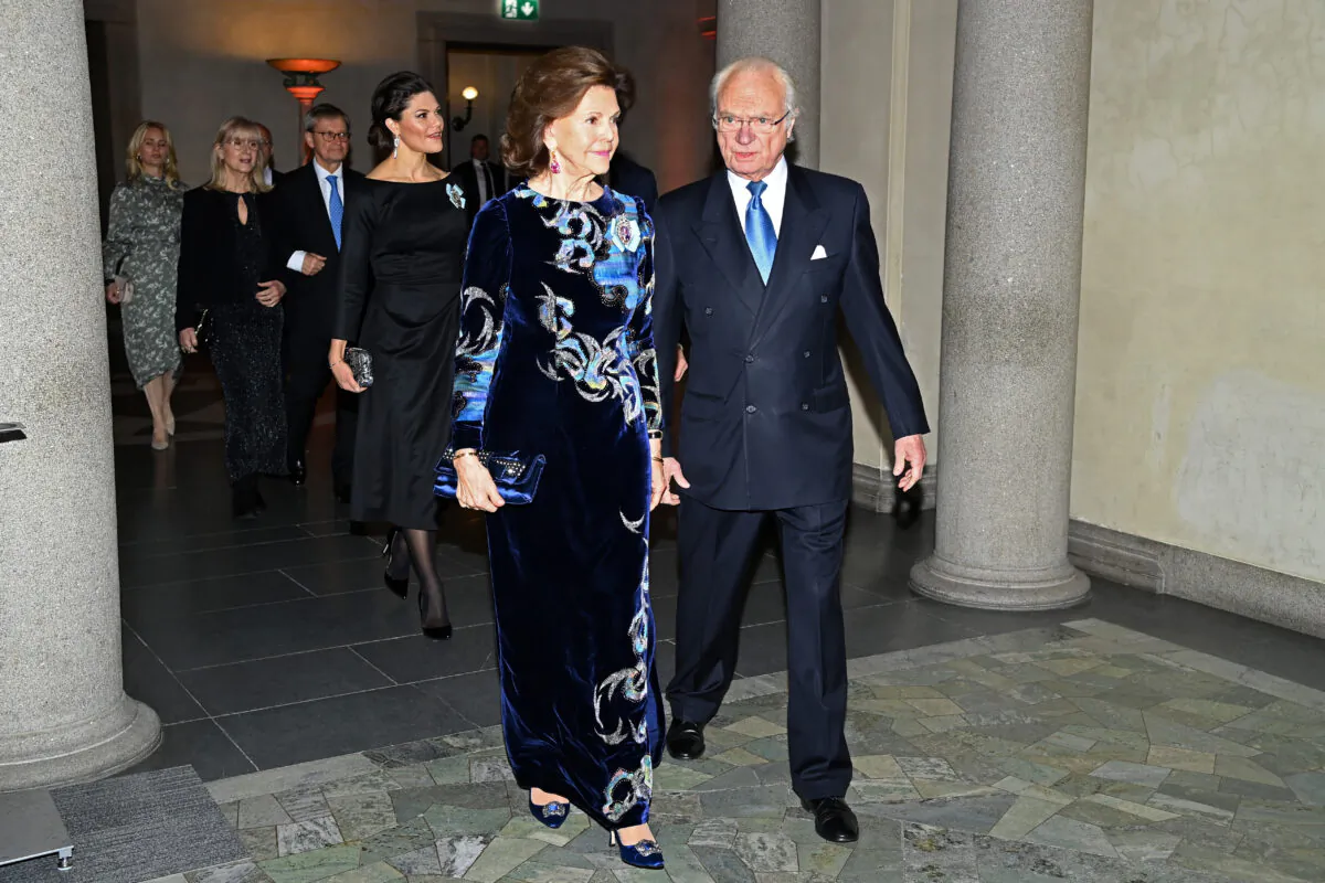 Queen Silvia and King Carl XVI Gustaf of Sweden arrive for the Nobel Prize Awards ceremony at the Concert Hall in Stockholm, Sweden, on Dec. 10, 2021. (Pascal Le Segretain/Getty Images) 