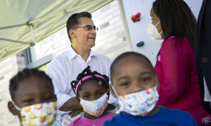 Masked children are seen as Health Secretary Xavier Becerra tours a Head Start program in Washington on June 30, 2021. (Drew Angerer/Getty Images)