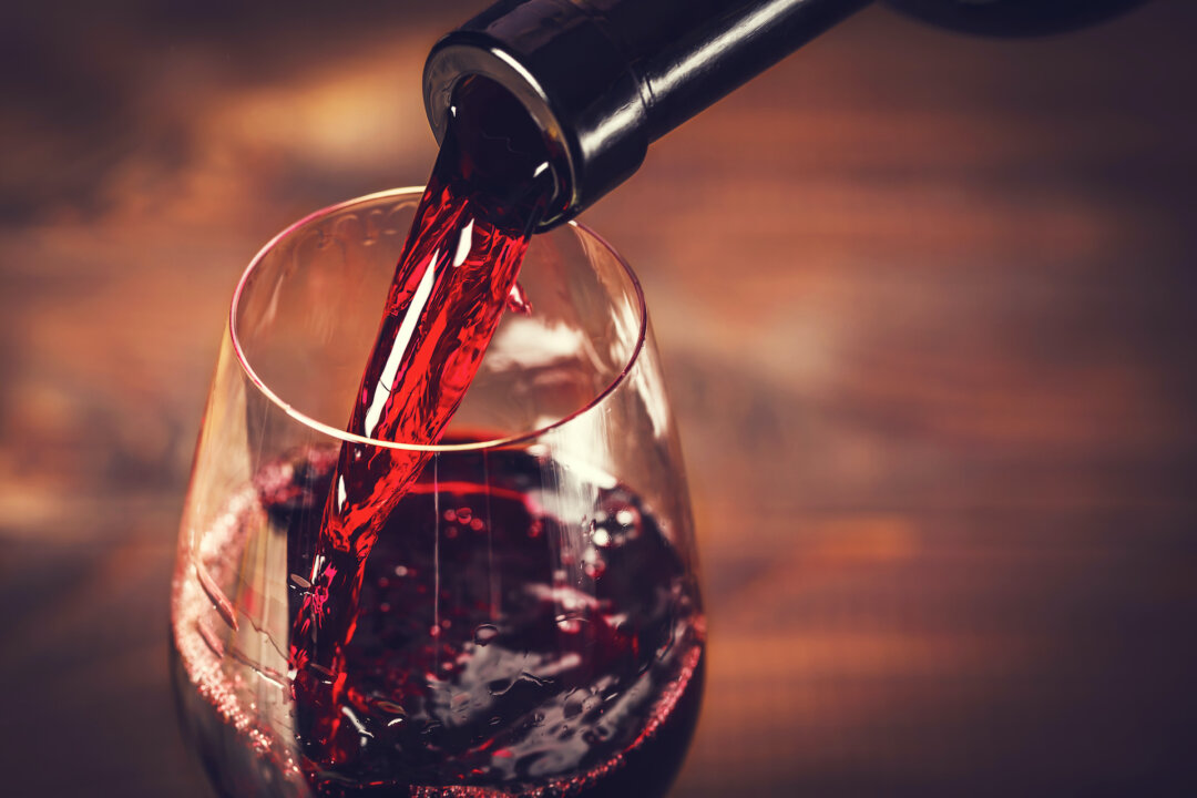 "If you love red wine, you’ve likely touted its purported health benefits. Unfortunately, those benefits may be overstated." (Ievgenii Meyer/Shutterstock)