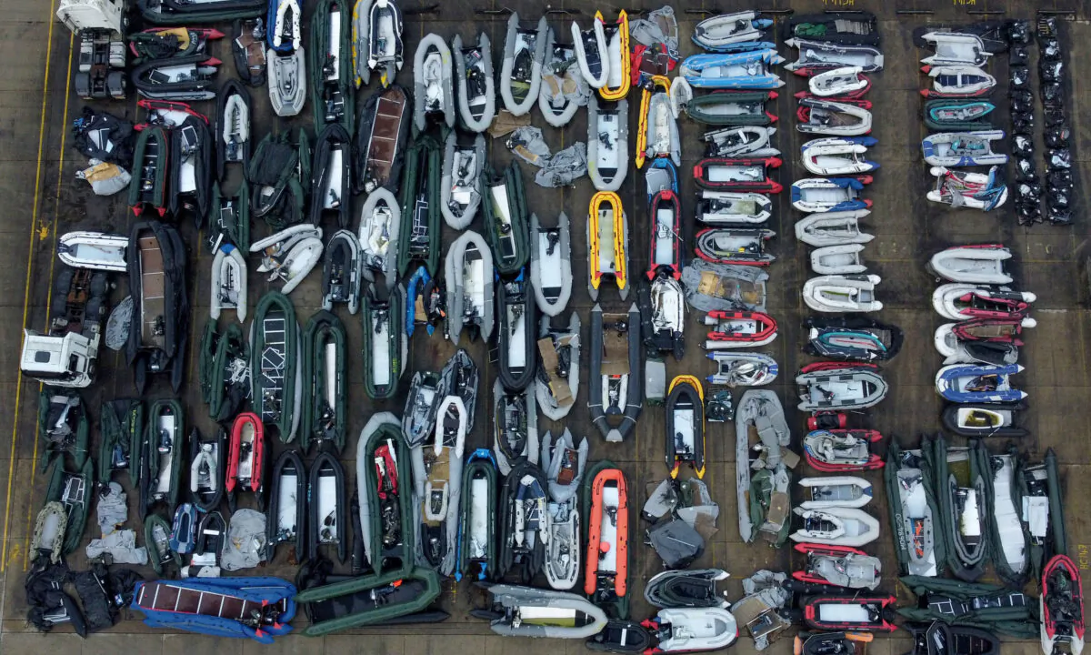A view of one of two areas being used for boats intercepted in the English Channel by the UK's Border Force at a warehouse facility in Dover, Kent, on July 27, 2021. (Gareth Fuller/PA)