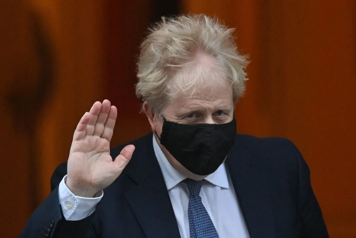 Britain's Prime Minister Boris Johnson leaves 10 Downing Street to take part in the weekly session of Prime Minister Questions at the House of Commons, in central London, on Jan. 5, 2022. (Justin Tallis/AFP via Getty Images)