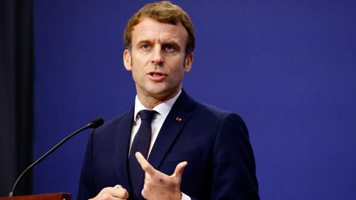 French President Emmanuel Macron gestures as he speaks during a joint press conference with the Hungarian Prime Minister in Budapest on Dec. 13, 2021. (Ludovic Marin/AFP via Getty Images)
