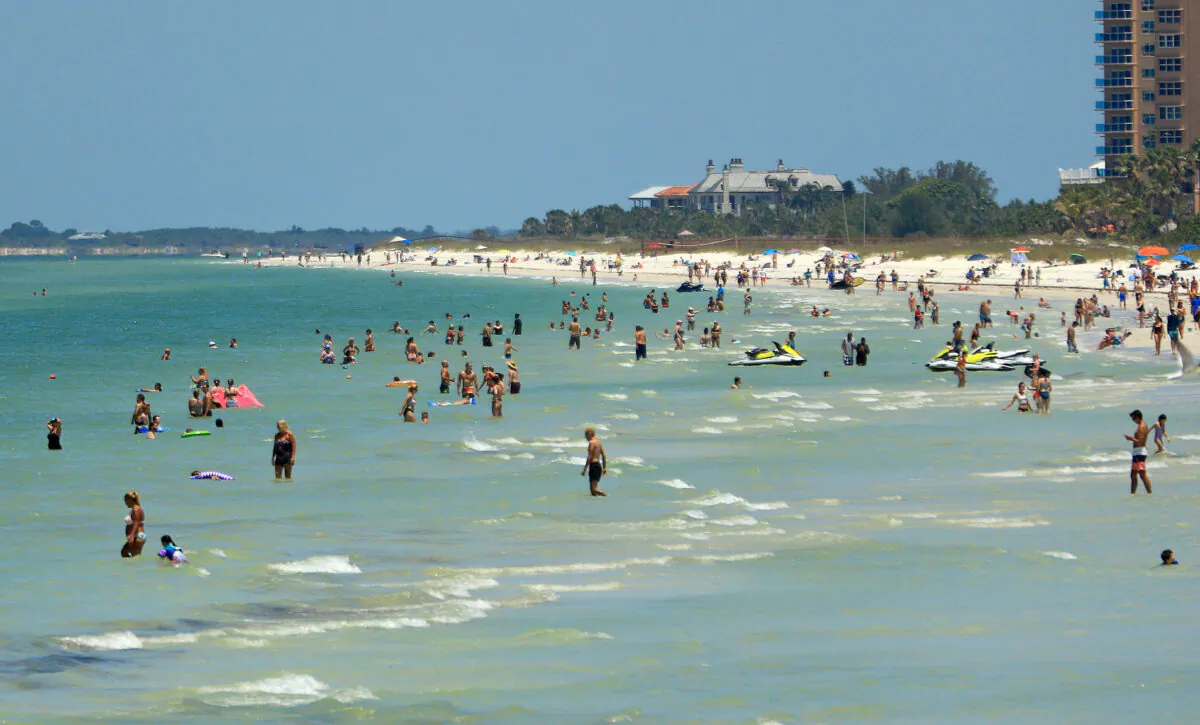 People visit Clearwater Beach after Gov. Ron DeSantis opened the beaches at 7am on May 4, 2020 in Clearwater, Fla. (Mike Ehrmann/Getty Images)