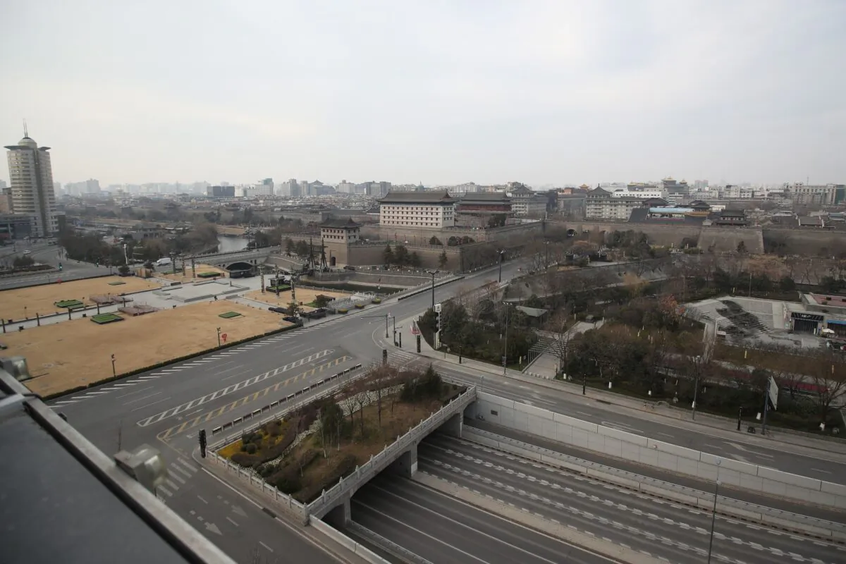 This photo shows nearly empty roads in Xi'an city, in China's Shaanxi Province, on Dec. 28, 2021. (STR/AFP via Getty Images)