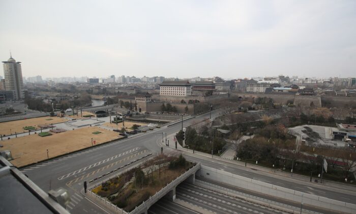 This photo shows nearly empty roads in Xi'an city, in China's Shaanxi Province, on Dec. 28, 2021. (STR/AFP via Getty Images)