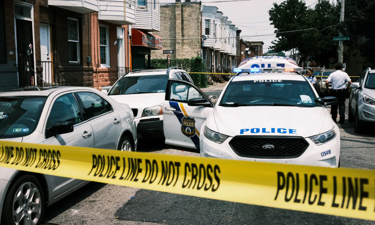 Police tape blocks a street where a person was recently shot in a drug related event in 
Kensington in Philadelphia, Pa., on July 19, 2021. (Spencer Platt/Getty Images)