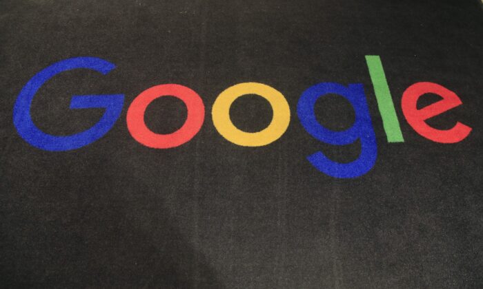 The logo of Google is displayed on a carpet at the entrance hall of Google France in Paris, on Nov. 18, 2019. (Michel Euler/AP Photo)