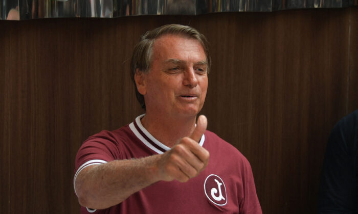 Brazil's President Jair Bolsonaro gestures during a press conference at the Vila Nova Star Hospital after he was discharged, in Sao Paulo, Brazil, on Jan. 5, 2022 (Nelson Almeida/AFP via Getty Images)