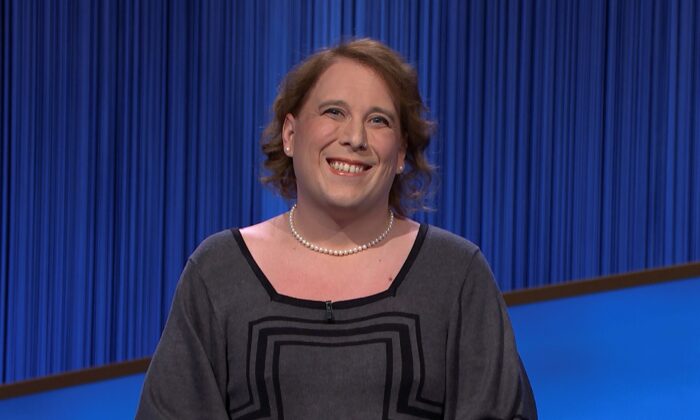 This image provided by Jeopardy Productions, Inc. shows game show champion Amy Schneider on the set of "Jeopardy!" Schneider the reigning "Jeopardy!" champion was robbed at gunpoint over New Year's weekend in Oakland, Calif. (Jeopardy Productions, Inc. via AP)