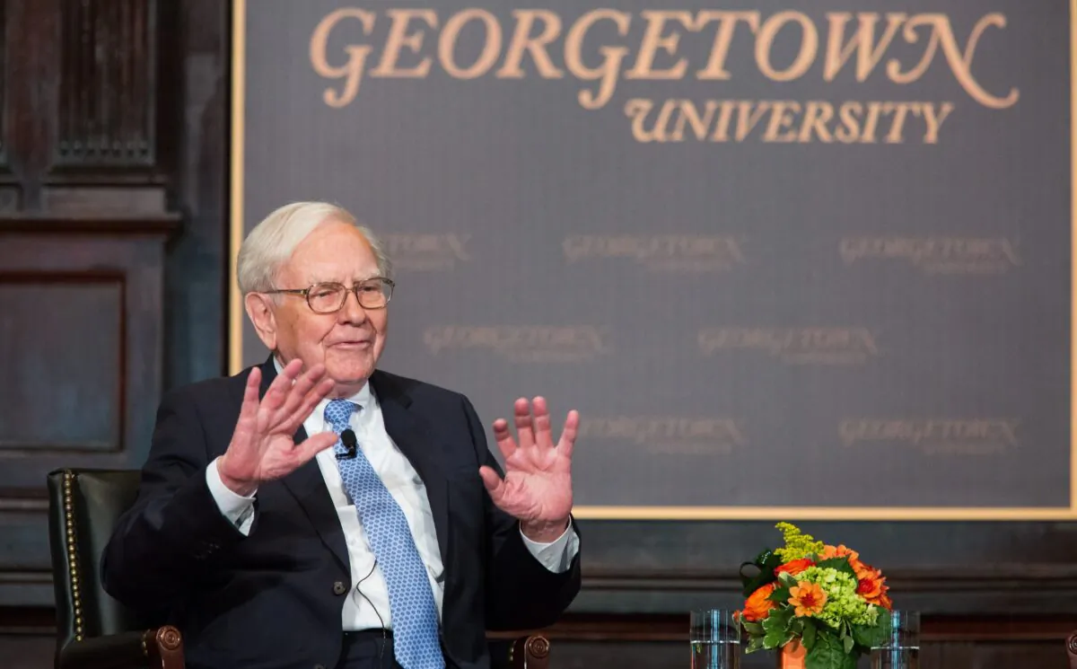 Warren Buffett, chairman of the board and CEO of Berkshire Hathaway, speaks in Gaston Hall at Georgetown University in Wash., on Sept. 19, 2013. (Drew Angerer/Getty Images)