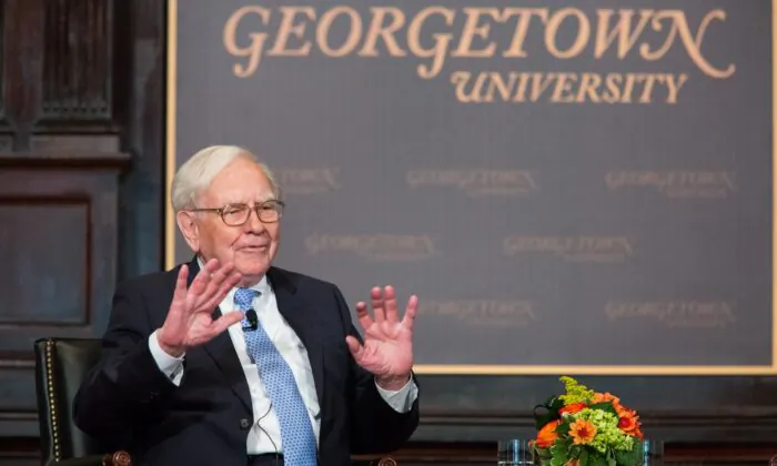 Warren Buffett, chairman of the board and CEO of Berkshire Hathaway, speaks in Gaston Hall at Georgetown University in Wash., on Sept. 19, 2013. (Drew Angerer/Getty Images)