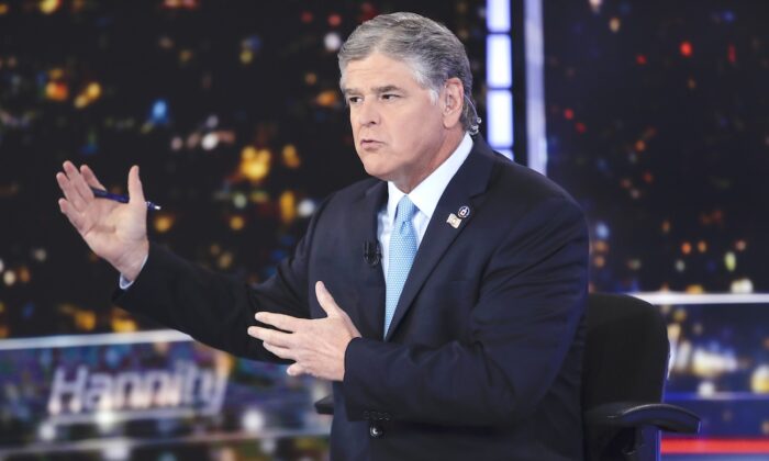 Fox News host Sean Hannity speaks during a taping of his show, "Hannity," in New York, on Aug. 7, 2019. (AP Photo/Frank Franklin II, File)