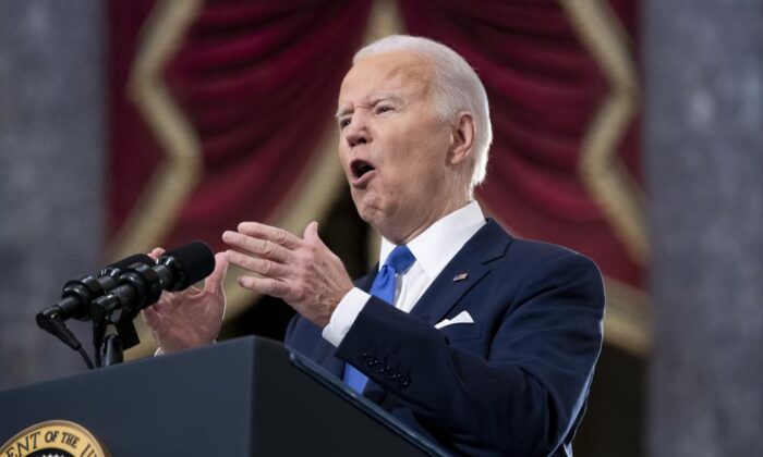 President Joe Biden speaks from Statuary Hall at the U.S. Capitol to mark the one year anniversary of the Jan. 6 riot at the U.S. Capitol by supporters loyal to then-President Donald Trump, Thursday, Jan. 6, 2022. (Michael Reynolds/Pool via AP)