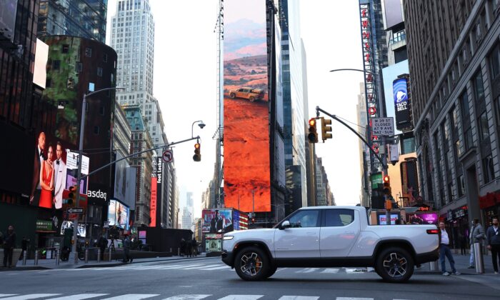 A Rivian electric truck is seen, as it drives through 44th Street in Times Square, New York City, N.Y., on Nov. 10, 2021. (Michael M. Santiago/Getty Images)