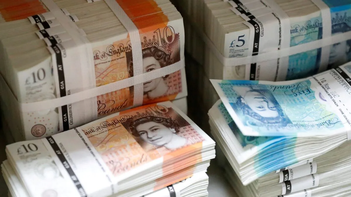 Wads of British Pound Sterling banknotes are stacked in piles, at the Money Service Austria company's headquarters in Vienna, Austria, on Nov. 16, 2017. (Leonhard Foeger/Reuters)