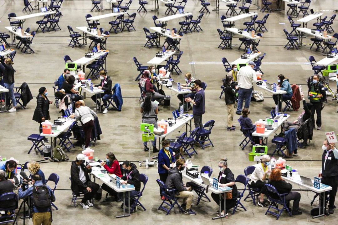 2021 COVID-19 Recap: 200 Million Vaccinated, 450,000 Dead