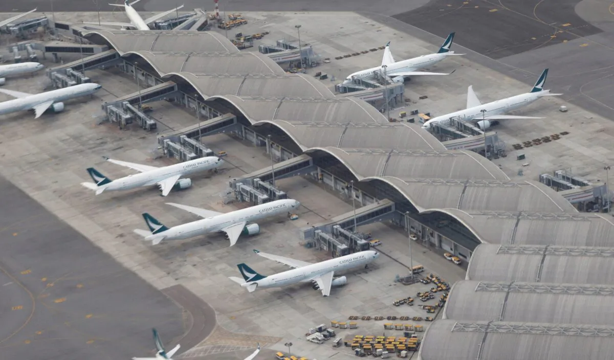 Cathay Pacific planes are parked on the tarmac at Hong Kong International Airport, Hong Kong, China, on Oct. 24 2020. (Tyrone Siu/Reuters)