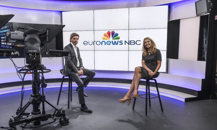 CEO of Euronews Michael Peters (L) and President of NBC News International Deborah Turness (R), pose at the headquarters of Euronews in Lyon, on May 31, 2017. (Philippe Desmazes/AFP via Getty Images)