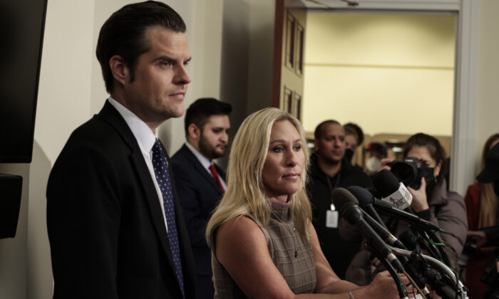 U.S. Rep. Matt Gaetz (R-Fla.) and Rep. Marjorie Taylor Greene (R-Ga.) speak at a news conference on Republican lawmakers' response to the Jan. 6 attack on the U.S. Capitol in Washington on Jan. 6, 2022. (Anna Moneymaker/Getty Images)
