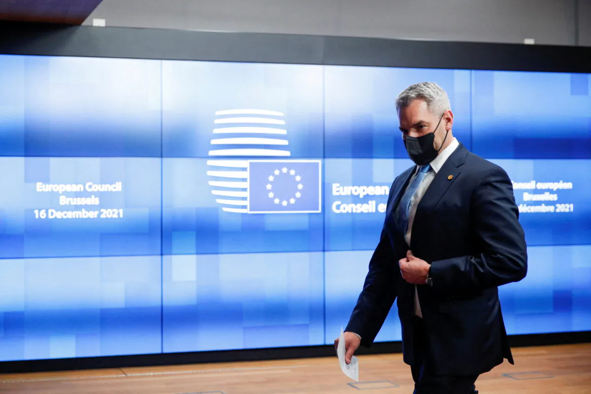 Austria's Chancellor Karl Nehammer departs after attending an EU Summit at the European Council building in Brussels on Dec. 17, 2021. (Johanna Geron/Reuters)