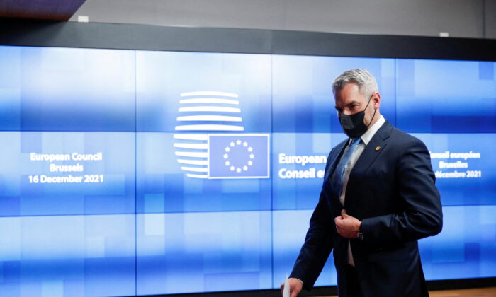 Austria's Chancellor Karl Nehammer departs after attending an EU Summit at the European Council building in Brussels on Dec. 17, 2021. (Johanna Geron/Reuters)