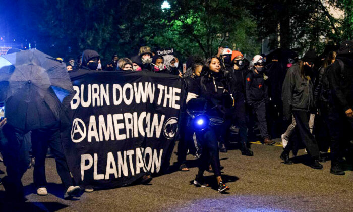 Antifa and Black Lives Matter demonstrators protest on election night near the White House in Washington, on Nov. 3, 2020. (Nicholas Kamm/AFP via Getty Images)