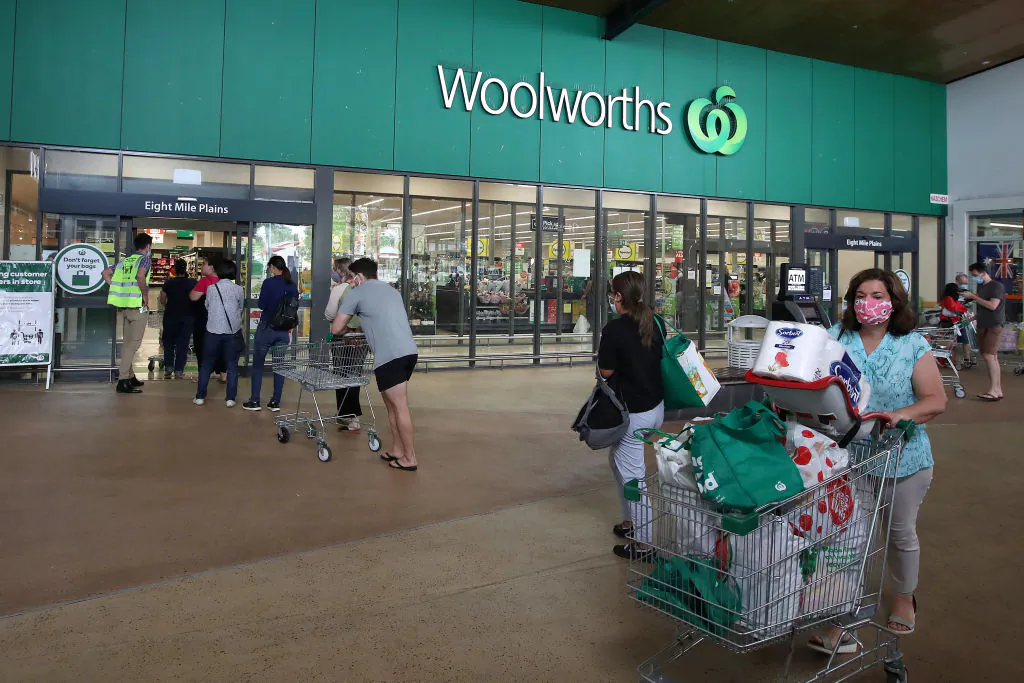 People stand in line outside a Woolworths supermarket at a southern suburb of Brisbane, Australia, on Jan. 8, 2021. (Jono Searle/Getty Images)