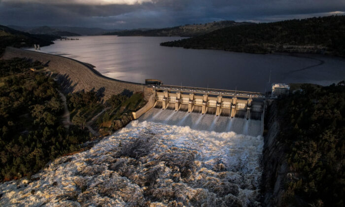 In this aerial view the Wyangala Dam is pictured as it spills after reaching 104% capacity  in Wyangala, Australia on November 15, 2021. (Photo by Brook Mitchell/Getty Images)