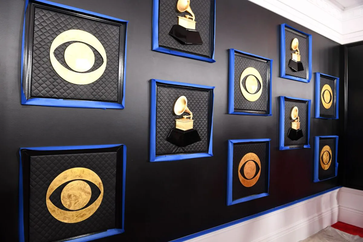 The CBS and Grammy logos are seen on a backdrop as the celebrity arrival area is being set up ahead of the 62nd Annual Grammy awards at LA Live, in Los Angeles, Calif., on Jan. 24, 2020. (Valerie Macon/AFP via Getty Images)