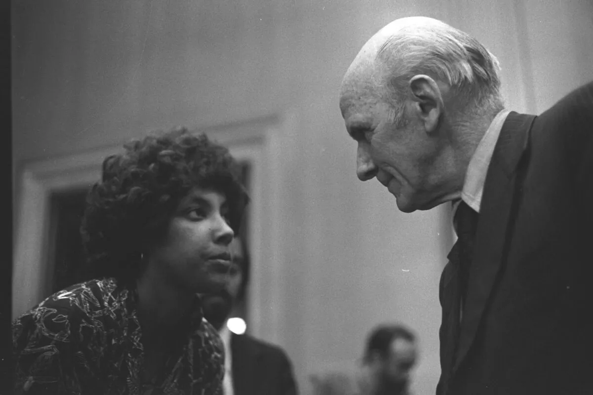 Joyce Jackson speaks to Senator Alan Cranston. Joyce was a member of a group who flew to Washington, D.C. after the longest sit-in in the nation's history in San Francisco in 1977, resulting in the signing of regulations that were the precursor for the Americans with Disabilities Act. (Photo by HolLynn D'Lil, participant in the 504 Demonstrations of 1977)