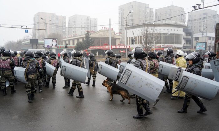 Riot police gather to block demonstrators during a protest in Almaty, Kazakhstan, on Jan. 5, 2022. (Vladimir Tretyakov/AP Photo)