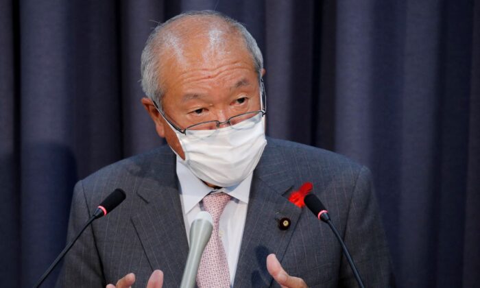 Japan's new Finance Minister Shunichi Suzuki wearing a protective mask, amid the coronavirus disease (COVID-19) outbreak, speaks at a news conference in Tokyo, Japan, on Oct. 5, 2021. (Kim Kyung-Hoon/Reuters)