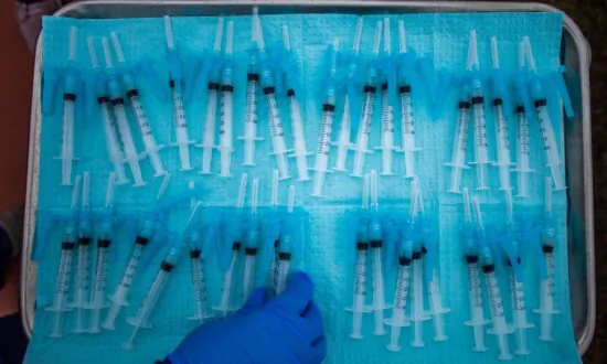 Illinois Adopts Biden’s Private Employer Vaccine Mandate