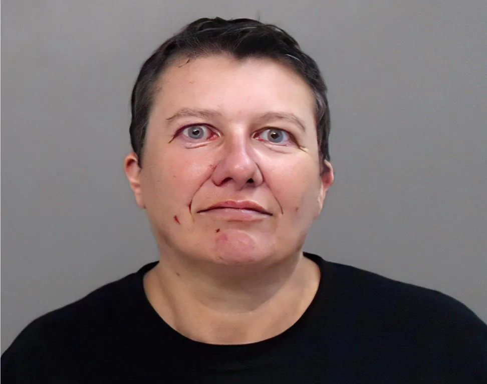 This photo provided by the Hidalgo County (Texas) Sheriff's Office, showing the booking photo of Pascale Ferrier. (Via AP/Hidalgo County (Texas) Sheriff's Office)