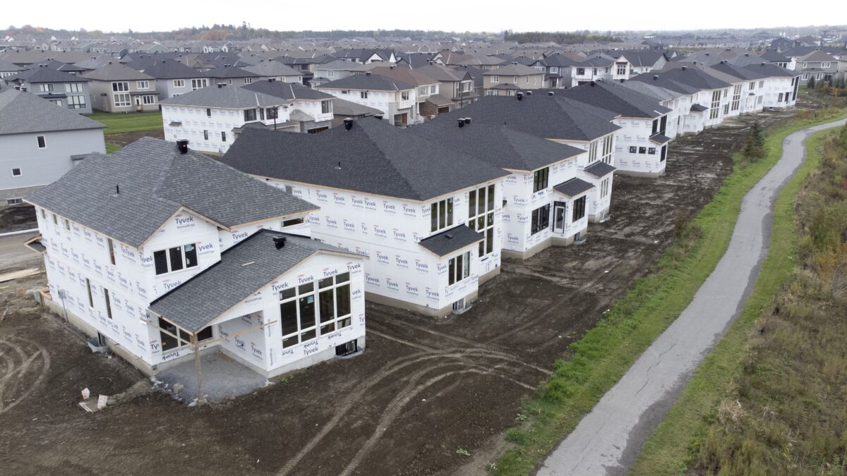 Homes under construction in a new suburb in Ottawa, on Oct. 15, 2021. (The Canadian Press/Adrian Wyld)