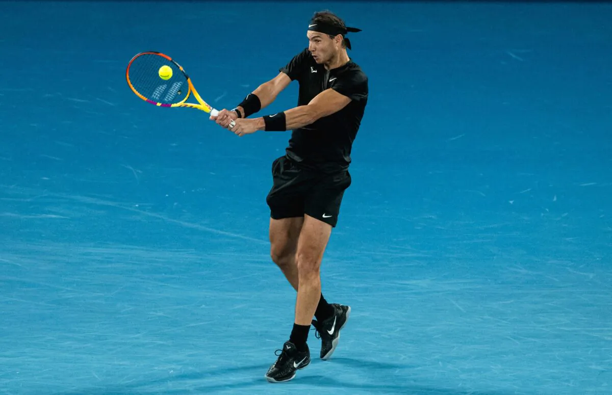 Rafael Nadal of Spain hits a return during his men's singles semi-final match against Emil Ruusuvuori of Finland at the Melbourne Summer Set tennis tournament in Melbourne, on Jan. 8, 2022. (Mike Frey/AFP via Getty Images)