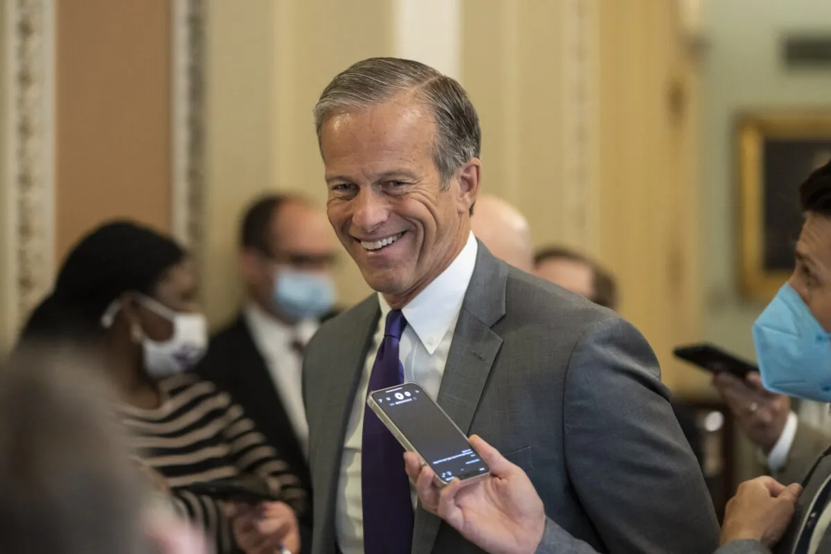 Sen. John Thune (R-S.D.) walks in Capitol Hill in Washington on Oct. 7, 2021. (Drew Angerer/Getty Images)