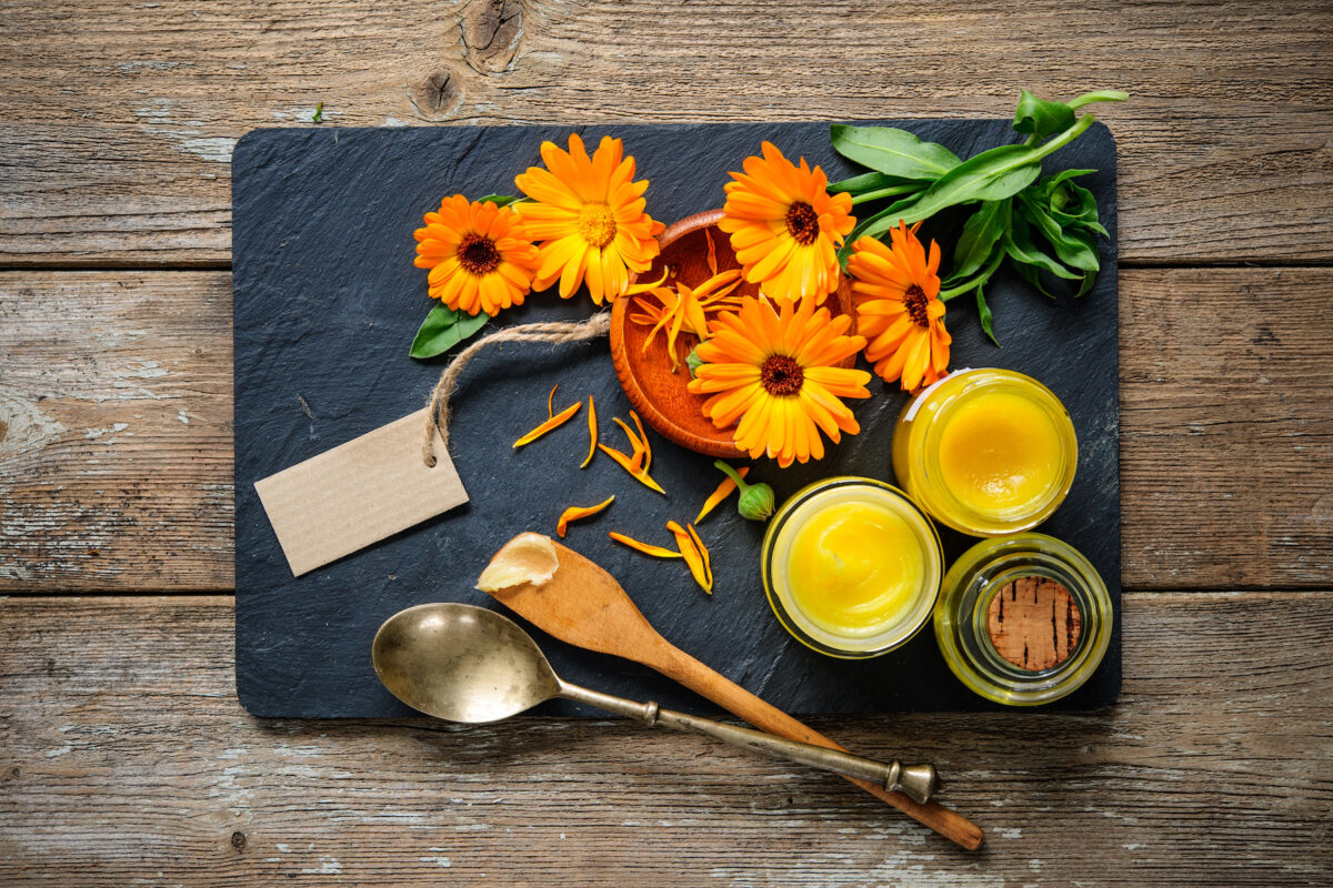 Homemade calendula ointment and oil By Alexander Raths/Shutterstock
