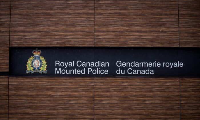 The RCMP logo is seen outside Royal Canadian Mounted Police "E" Division Headquarters, in Surrey, B.C., on April 13, 2018. (The Canadian Press/Darryl Dyck)