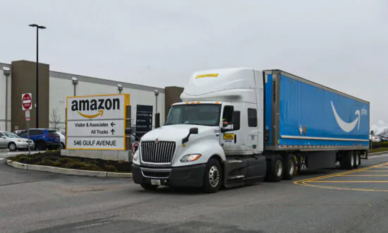 Freight Carrier Shares Fall as Amazon Escalates Logistics Push