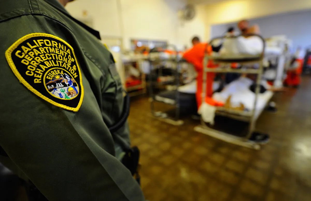 A California Department of Corrections officer speaks to inmates at Chino State Prison in Chino, Calif., on Dec. 10, 2010. (Kevork Djansezian/Getty Images)