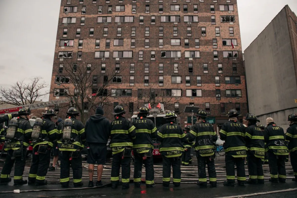 Emergency first responders remain at the scene after an intense fire at a 19-story residential building that erupted in the Bronx borough of New York City on the morning of Jan. 9, 2022. (Scott Heins/Getty Images)