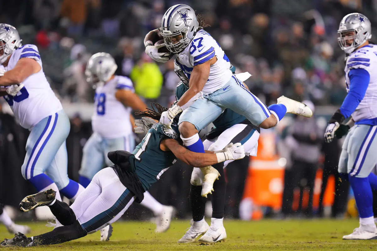 JaQuan Hardy #37 of the Dallas Cowboys runs with the ball for a touchdown in the fourth quarter of the game against the Philadelphia Eagles at Lincoln Financial Field, in Philadelphia, on Jan. 8, 2022. (Mitchell Leff/Getty Images)